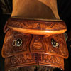 Modified Association Tree - 94 degree bars - #1 choice for fitting powerfull well muscled shoulder horses very well including half drafts - 16 inch seat - cantle is 4 inches high by 12 1/2 inches wide and has a 1 3/4 inch Cheyenne roll - horn is 4 inch high metal dally horn with a heavy mule hide ropping bonnet - Double D rigging set at 7/8ths - previously loved with a couple of generations to love back - half tooled with a classic Sheridan Floral design all hand worked by Keith Valley.